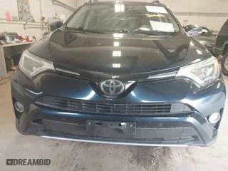 2017 Toyota RAV4 XLE with VIN JTMRFREV6HD208421, listed as a IAAI auction lot 42078130 with 228,365 mi miles. Bid and sale history available at carsss.com. Image 12.