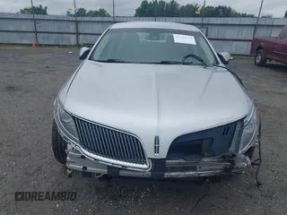 2013 Lincoln MKS с VIN 1LNHL9DK3DG604712, выставлен на аукционе IAAI как лот 42351237 с пробегом 144 927 миль миль и . История ставок и продаж доступна на DreamBid. Изображение 6.