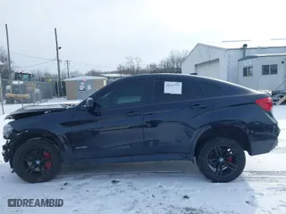 2015 BMW X6 xDrive50i with VIN 5UXKU6C54F0F94383, listed as a IAAI auction lot 41467773 with 114,560 mi miles. Bid and sale history available at carsss.com. Image 14.
