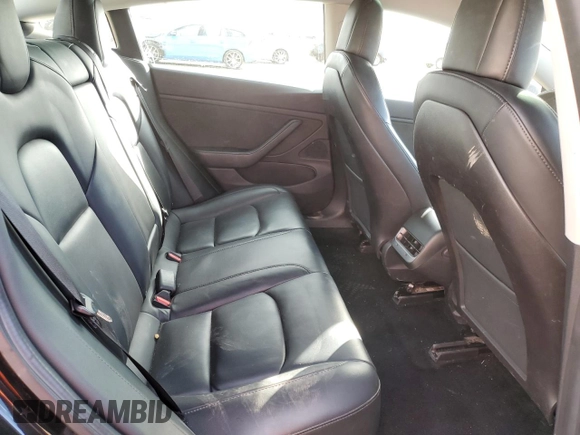 2019 Tesla Model 3 Mid Range z VIN 5YJ3E1EA7KF420025, wystawiony jako Copart lot #56149015 z przebiegiem 253 771 mil mil oraz Szkoda całkowita • Salvage title. Historia ofert i sprzedaży dostępna na DreamBid. Obrazek 10.