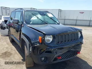 2017 Jeep Renegade Trailhawk z VIN ZACCJBCB4HPE54731, wystawiony jako IAAI lot #42282950 z przebiegiem 101 418 mil mil oraz . Historia ofert i sprzedaży dostępna na DreamBid. Obrazek 1.