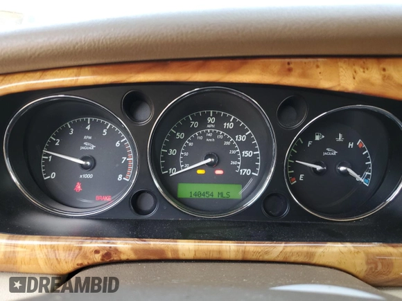 2008 Jaguar XJ with VIN SAJWA79BX8SH23430, listed as a Copart auction lot 51990785 with 140,454 mi miles and Salvage Title. Bid and sale history available at carsss.com. Image 9.
