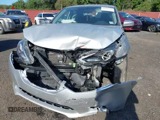 2019 Nissan Sentra S with VIN 3N1AB7AP4KY362315, listed as a IAAI auction lot 40266339 with 76,901 mi miles and . Bid and sale history available at DreamBid. Image 6.