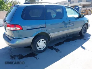 2002 Toyota Sienna LE with VIN 4T3ZF13C02U442678, listed as a IAAI auction lot 42241435 with 218,501 mi miles and . Bid and sale history available at DreamBid. Image 4.