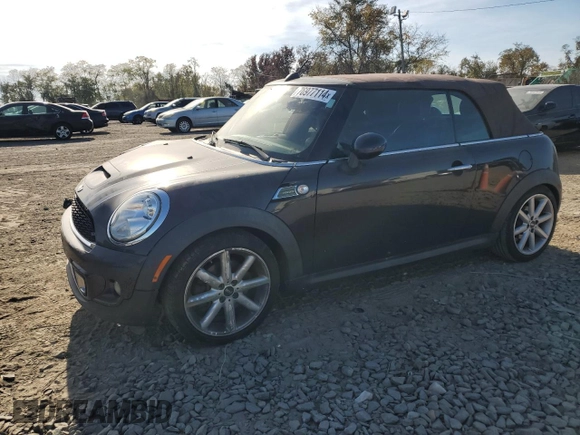 2014 MINI Convertible S with VIN WMWZP3C55ET298172, listed as a Copart auction lot 76977114 with 119,138 mi miles and Salvage title. Bid and sale history available at DreamBid. Image 1.