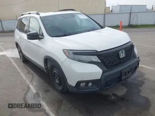 2019 Honda Passport Touring z VIN 5FNYF7H93KB002861, wystawiony jako IAAI lot #41636806 z przebiegiem 158 843 mil mil oraz . Historia ofert i sprzedaży dostępna na DreamBid. Obrazek 1.
