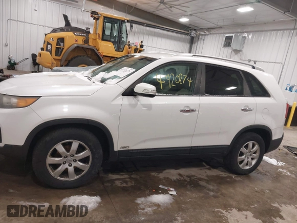 2012 Kia Sorento LX with VIN 5XYKTDA28CG217978, listed as a IAAI auction lot 41920274 with 151,978 mi miles. Bid and sale history available at carsss.com. Image 14.