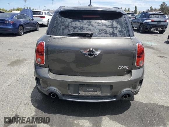 2011 MINI Countryman S with VIN WMWZC5C5XBWL55516, listed as a Copart auction lot 63239235 with 137,545 mi miles and Salvage title. Bid and sale history available at DreamBid. Image 6.