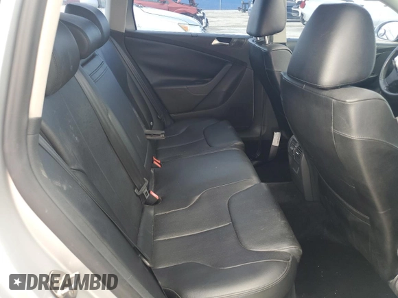 2009 Volkswagen Passat Komfort with VIN WVWXK73C09E140427, listed as a Copart auction lot 60374115 with 113,923 mi miles and Salvage title. Bid and sale history available at DreamBid. Image 10.