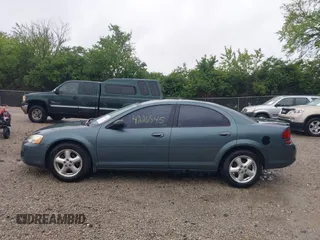 2005 Dodge Stratus SXT z VIN 1B3EL46X15N679491, wystawiony jako IAAI lot #42265145 z przebiegiem 147 463 mil mil oraz . Historia ofert i sprzedaży dostępna na DreamBid. Obrazek 14.