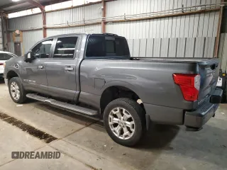 2016 Nissan Titan Platinum Reserve z VIN 1N6BA1F27GN517455, wystawiony jako Copart lot #51257125 z przebiegiem 156 675 mil mil oraz Czysty tytuł • Clean title. Historia ofert i sprzedaży dostępna na DreamBid. Obrazek 2.