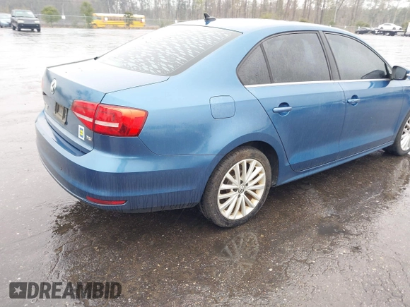 2015 Volkswagen Jetta Sedan 1.8T SE w/Connectivity with VIN 3VWD07AJ9FM329266, listed as a IAAI auction lot 41608542 with 150,476 mi miles. Bid and sale history available at carsss.com. Image 4.