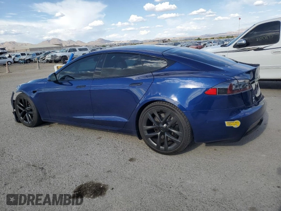 2021 Tesla Model S Long Range z VIN 5YJSA1E52MF437103, wystawiony jako Copart lot #55533515 z przebiegiem 59 015 mil mil oraz Szkoda całkowita • Salvage title. Historia ofert i sprzedaży dostępna na DreamBid. Obrazek 2.