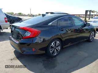 2018 Honda Civic EX-T z VIN 19XFC1F35JE200003, wystawiony jako IAAI lot #42393392 z przebiegiem 90 337 mil mil oraz . Historia ofert i sprzedaży dostępna na DreamBid. Obrazek 4.