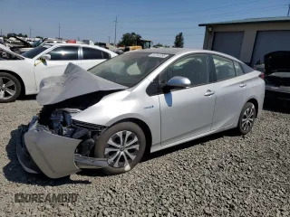 2020 Toyota Prius LE z VIN JTDL9RFU0L3021371, wystawiony jako Copart lot #64762295 z przebiegiem 66 686 mil mil oraz Szkoda całkowita • Salvage title. Historia ofert i sprzedaży dostępna na DreamBid. Obrazek 1.
