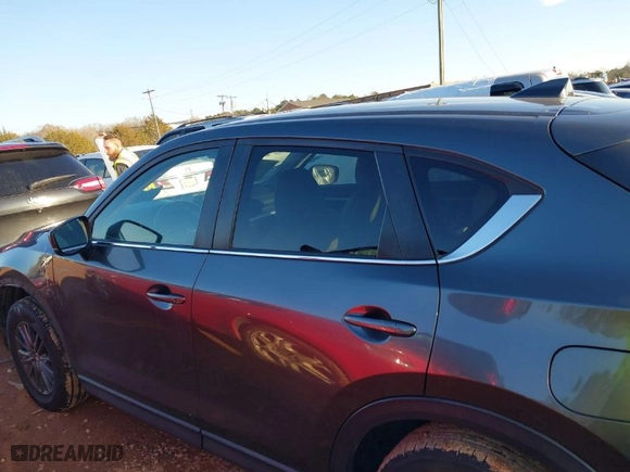 2019 Mazda CX-5 Touring with VIN JM3KFACM0K0668242, listed as a IAAI auction lot 41308376 with NaN miles. Bid and sale history available at carsss.com. Image 14.