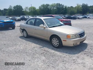 2004 Kia Optima LX z VIN KNAGD126845341047, wystawiony jako IAAI lot #42588996 z przebiegiem 100 925 mil mil oraz . Historia ofert i sprzedaży dostępna na DreamBid. Obrazek 1.
