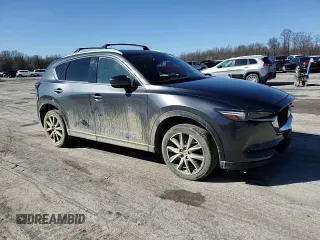 2018 Mazda CX-5 Grand Touring with VIN JM3KFBDM2J0407164, listed as a Copart auction lot 50080345 with 126,464 mi miles and Salvage title. Bid and sale history available at DreamBid. Image 12.
