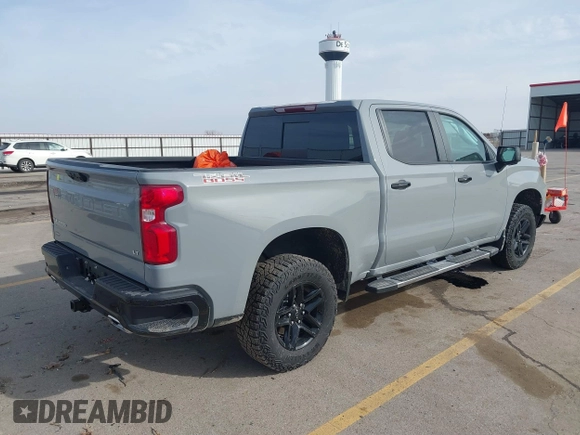 2024 Chevrolet Silverado 1500 LT Trail Boss with VIN 3GCUDFE83RG314063, listed as a IAAI auction lot 41824385 with 14,164 mi miles and . Bid and sale history available at DreamBid. Image 4.