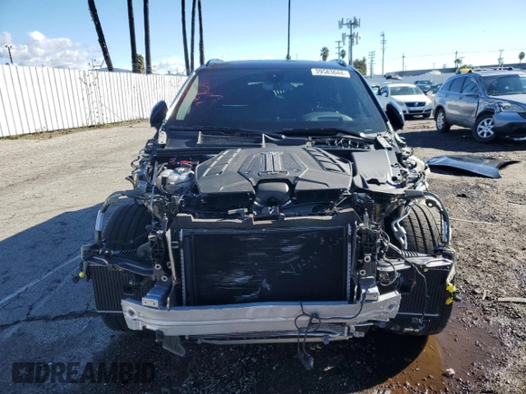2022 Bentley Bentayga V8 z VIN SJAAM2ZV6NC016276, wystawiony jako Copart lot #39583644 z przebiegiem 5412 mil mil oraz . Historia ofert i sprzedaży dostępna na DreamBid. Obrazek 5.