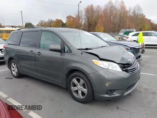 2012 Toyota Sienna LE AAS with VIN 5TDKK3DC5CS253020, listed as a IAAI auction lot 40900034 with 208,421 mi miles. Bid and sale history available at carsss.com. Image 1.