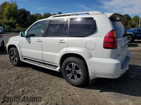 2004 Lexus GX 470 with VIN JTJBT20XX40033938, listed as a Copart auction lot 70871164 with 214,565 mi miles and Salvage Title. Bid and sale history available at carsss.com. Image 2.