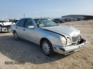 1999 Mercedes-Benz E-Class with VIN WDBJF65H9XA903481, listed as a Copart auction lot 79516914 with 201,080 mi miles and Salvage Title. Bid and sale history available at carsss.com. Image 4.