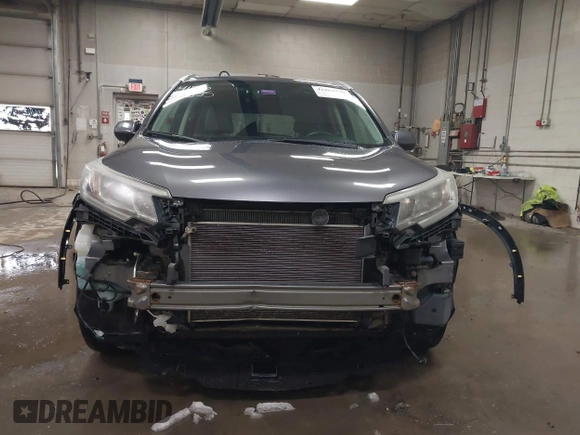 2015 Honda CR-V EX-L with VIN 2HKRM4H75FH604059, listed as a IAAI auction lot 41869535 with 131,848 mi miles. Bid and sale history available at carsss.com. Image 6.