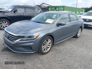 2020 Volkswagen Passat SE with VIN 1VWSA7A37LC022116, listed as a IAAI auction lot 42727604 with 97,271 mi miles and . Bid and sale history available at DreamBid. Image 2.