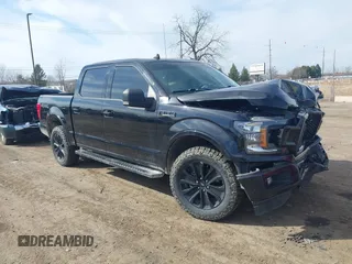 2020 Ford F-150 XL with VIN 1FTEW1E47LFC21232, listed as a IAAI auction lot 41824403 with 92,318 mi miles. Bid and sale history available at carsss.com. Image 1.