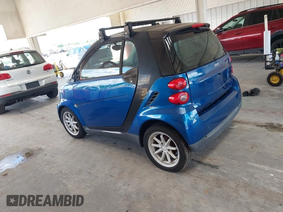 2008 Smart fortwo Pure with VIN WMEEJ31X28K123879, listed as a IAAI auction lot 42258663 with 93,056 mi miles and . Bid and sale history available at DreamBid. Image 3.