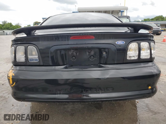 1997 Ford Mustang z VIN 1FALP4049VF169429, wystawiony jako Copart lot #59153175 z przebiegiem 134 454 mil mil oraz Szkoda całkowita • Salvage title. Historia ofert i sprzedaży dostępna na DreamBid. Obrazek 6.