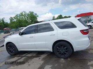 2019 Dodge Durango SXT Plus with VIN 1C4RDJAG3KC821124, listed as a IAAI auction lot 42214374 with 102,134 mi miles and . Bid and sale history available at DreamBid. Image 14.