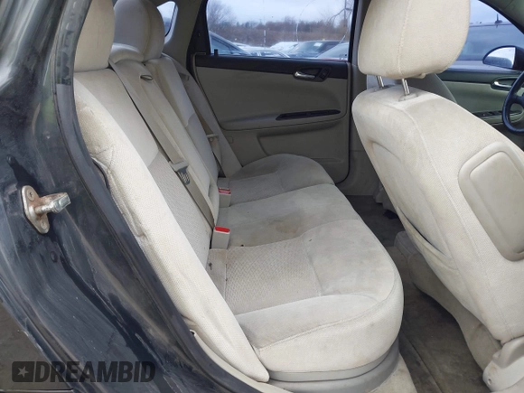 2014 Chevrolet Impala LT with VIN 2G1WB5E35E1123415, listed as a IAAI auction lot 41101111 with 129,870 mi miles and . Bid and sale history available at DreamBid. Image 8.