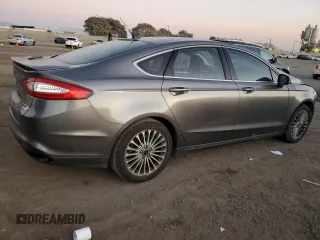 2014 Ford Fusion Titanium with VIN 3FA6P0K9XER367549, listed as a Copart auction lot 85566204 with 117,243 mi miles and Salvage Title. Bid and sale history available at DreamBid. Image 3.