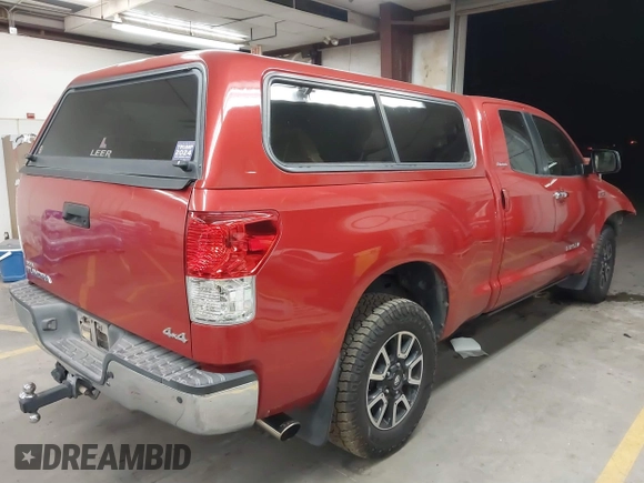 2011 Toyota Tundra 4WD Truck LTD with VIN 5TFBY5F12BX166531, listed as a IAAI auction lot 41680915 with 164,314 mi miles. Bid and sale history available at carsss.com. Image 4.