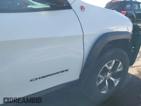 2018 Jeep Cherokee Trailhawk with VIN 1C4PJMBX7JD550173, listed as a IAAI auction lot 41094306 with 74,128 mi miles. Bid and sale history available at carsss.com. Image 18.