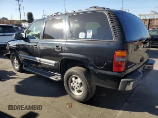 2002 Chevrolet Tahoe LS with VIN 1GNEC13V62R244378, listed as a Copart auction lot 84209834 with 350,780 mi miles and Salvage Title. Bid and sale history available at carsss.com. Image 2.