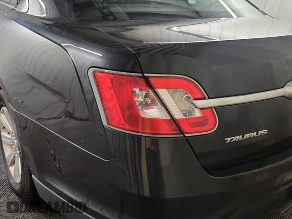 2011 Ford Taurus Limited with VIN 1FAHP2FW0BG147778, listed as a IAAI auction lot 42666687 with 283,665 mi miles and . Bid and sale history available at DreamBid. Image 25.