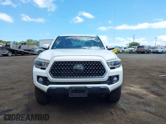 2018 Toyota Tacoma SR5 with VIN 3TMDZ5BN5JM048038, listed as a IAAI auction lot 42084922 with 79,718 mi miles and . Bid and sale history available at DreamBid. Image 12.