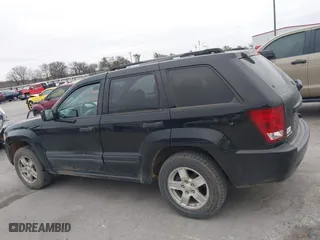 2006 Jeep Grand Cherokee Laredo with VIN 1J4GS48KX6C322538, listed as a IAAI auction lot 41282093 with 176,901 mi miles. Bid and sale history available at carsss.com. Image 14.