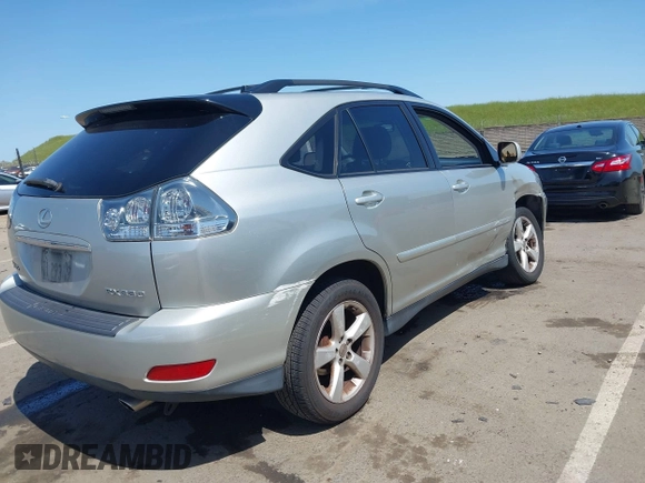 2004 Lexus RX 330 with VIN JTJHA31U340061672, listed as a IAAI auction lot 41979906 with 166,733 mi miles. Bid and sale history available at carsss.com. Image 4.