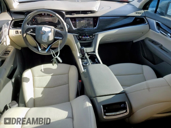 2024 Cadillac XT6 FWD Premium Luxury with VIN 1GYKPCRS7RZ704046, listed as a Copart auction lot 62534055 with 25,644 mi miles and Salvage title. Bid and sale history available at DreamBid. Image 8.