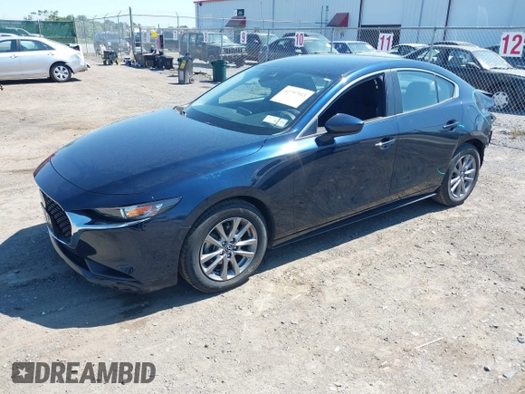 2021 Mazda 3 S with VIN JM1BPAALXM1341814, listed as a IAAI auction lot 42797513 with 32,167 mi miles and . Bid and sale history available at DreamBid. Image 2.