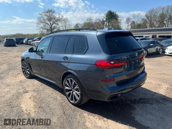 2022 BMW X7 M50i z VIN 5UXCX6C09N9K44917, wystawiony jako Copart lot #54822275 z przebiegiem 123 855 mil mil oraz Tytuł czysty. Historia ofert i sprzedaży dostępna na DreamBid. Obrazek 2.