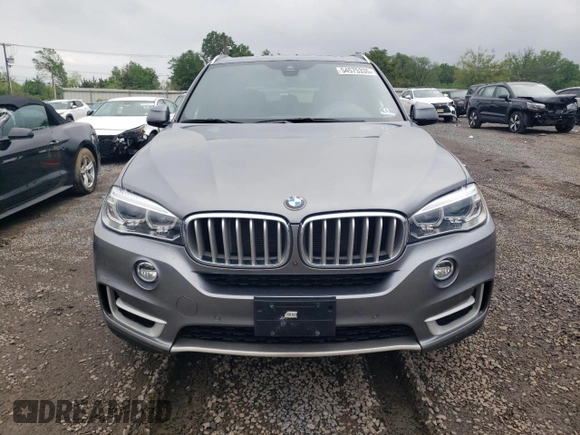 2017 BMW X5 xDrive50i with VIN 5UXKR6C30H0U13764, listed as a Copart auction lot 54575335 with 27,539 mi miles and Salvage title. Bid and sale history available at DreamBid. Image 5.