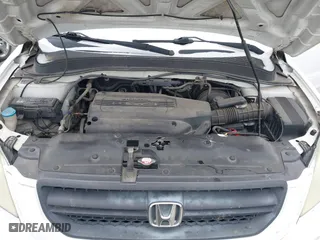 2004 Honda Pilot EX with VIN 2HKYF18464H503605, listed as a IAAI auction lot 41373673 with 112,919 mi miles. Bid and sale history available at carsss.com. Image 10.