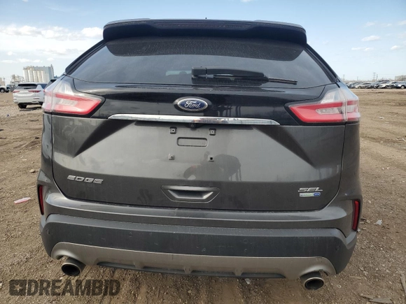 2019 Ford Edge SEL z VIN 2FMPK4J94KBB70789, wystawiony jako Copart lot #52565675 z przebiegiem 82 888 mil mil oraz Szkoda całkowita • Salvage title. Historia ofert i sprzedaży dostępna na DreamBid. Obrazek 6.
