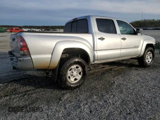 2010 Toyota Tacoma PreRunner with VIN 3TMJU4GN6AM102922, listed as a Copart auction lot 49826455 with 302,827 mi miles and Salvage Title. Bid and sale history available at DreamBid. Image 3.