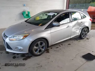 2014 Ford Focus SE with VIN 1FADP3F28EL433519, listed as a IAAI auction lot 41969007 with 137,064 mi miles. Bid and sale history available at carsss.com. Image 2.